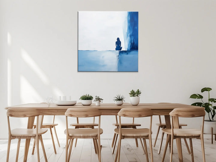 Contemplative Blue Solitary Figure Wall Art in Dining Room